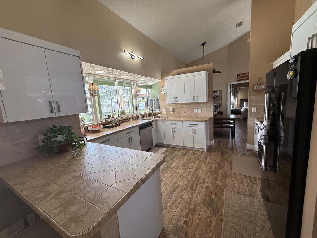 Photo of 2702 SE Bishop Avenue, Port Saint Lucie, FL 34952 (MLS # B26049852)