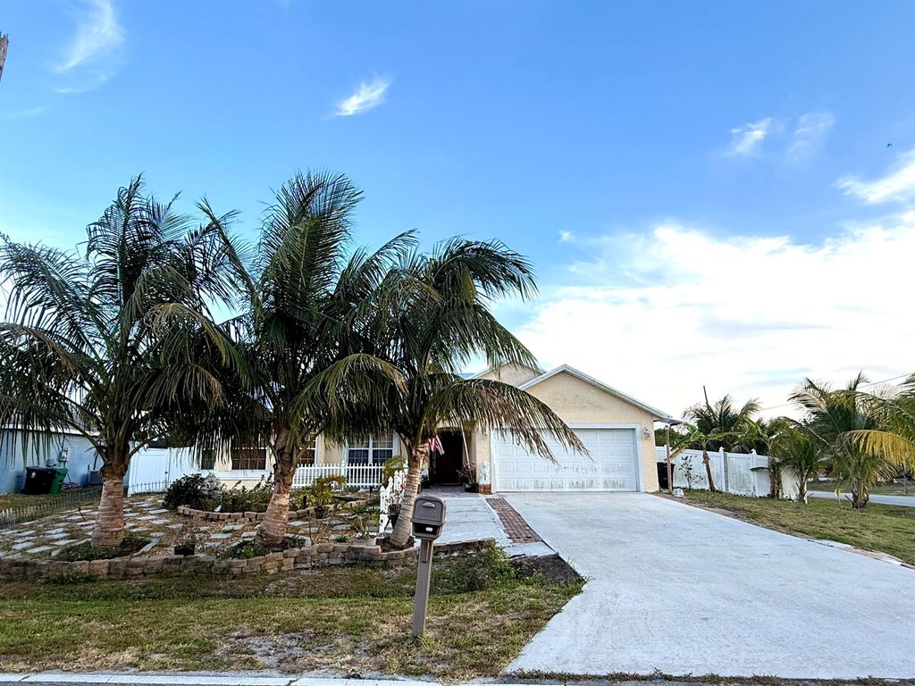 Photo of 126 SW Glenwood Drive, Port Saint Lucie, FL 34953 (MLS # R11093663)