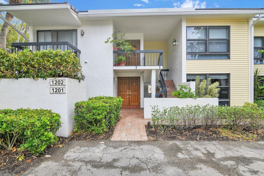 Rarely available. Expanded remodeled ground floor garden apartment. Marble floors. Hurricane impact windows and doors. Remodeled kitchen and bathrooms.  Live the unbeatable Boca West Country Club lifestyle.   Club membership required at $150,000. plus dues.  Plus a mandatory $10,000 capital contribution to the Boca West Master Association.