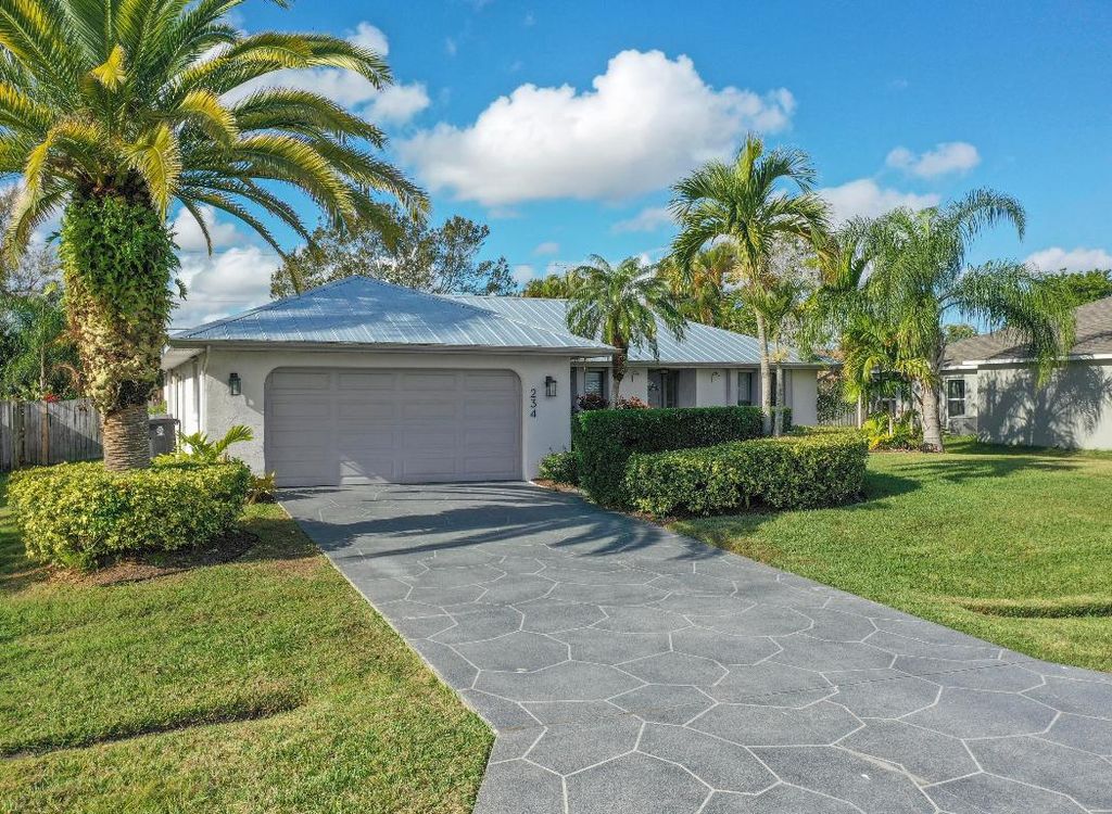 Photo of 234 SE Whitmore Drive, Port Saint Lucie, FL 34984 (MLS # R11154260)