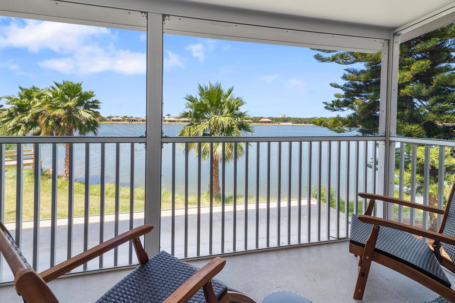HURRY! Island Dream Opportunity! Yours to use or share the experience for seasonal / short term guests, sold furnished turnkey! INCOME POTENTIAL! Desirable beach home features an immaculate & updated interior w/ coastal blues, soft neutral tones complimented by modern sleek appliances and gold fixtures. The minimalist Zen-like decor & open spaciousness is harmonious with the gorgeous lakefront setting! Take it all in from your living area or the screened patio with coffee or an evening refreshments w/ friends! The ever changing views offer stunning sunrises & sunsets, NASA rocket launches provide remarkable light shows from an hour away, to the natural wildlife that enjoys the lake setting too! Don't miss your chance to embrace the unhurried, tranquil lifestyle of Hutchinson Island!