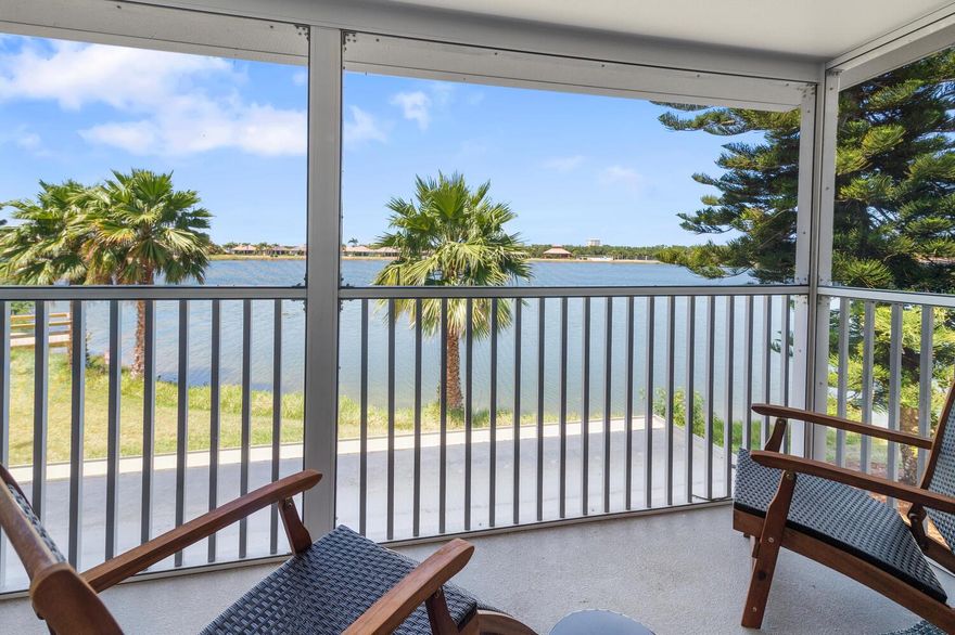 HURRY! Island Dream Opportunity! Yours to use or share the experience for seasonal / short term guests, sold furnished turnkey!  INCOME POTENTIAL! Desirable beach home features an immaculate & updated interior w/ coastal blues, soft neutral tones complimented by modern sleek appliances and gold fixtures. The minimalist Zen-like decor & open spaciousness is harmonious with the gorgeous lakefront setting! Take it all in from your living area or the screened patio with coffee or an evening refreshments w/ friends! The ever changing views offer stunning sunrises & sunsets, NASA rocket launches provide remarkable light shows from an hour away, to the natural wildlife that enjoys the lake setting too! Don't miss your chance to embrace the unhurried, tranquil lifestyle of Hutchinson Island!