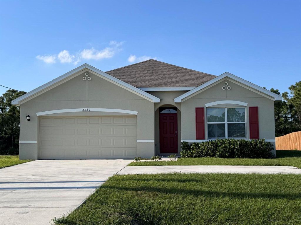 Photo of 2526 SW Savage Boulevard, Port St Lucie, FL 34953 (MLS # R11088105)