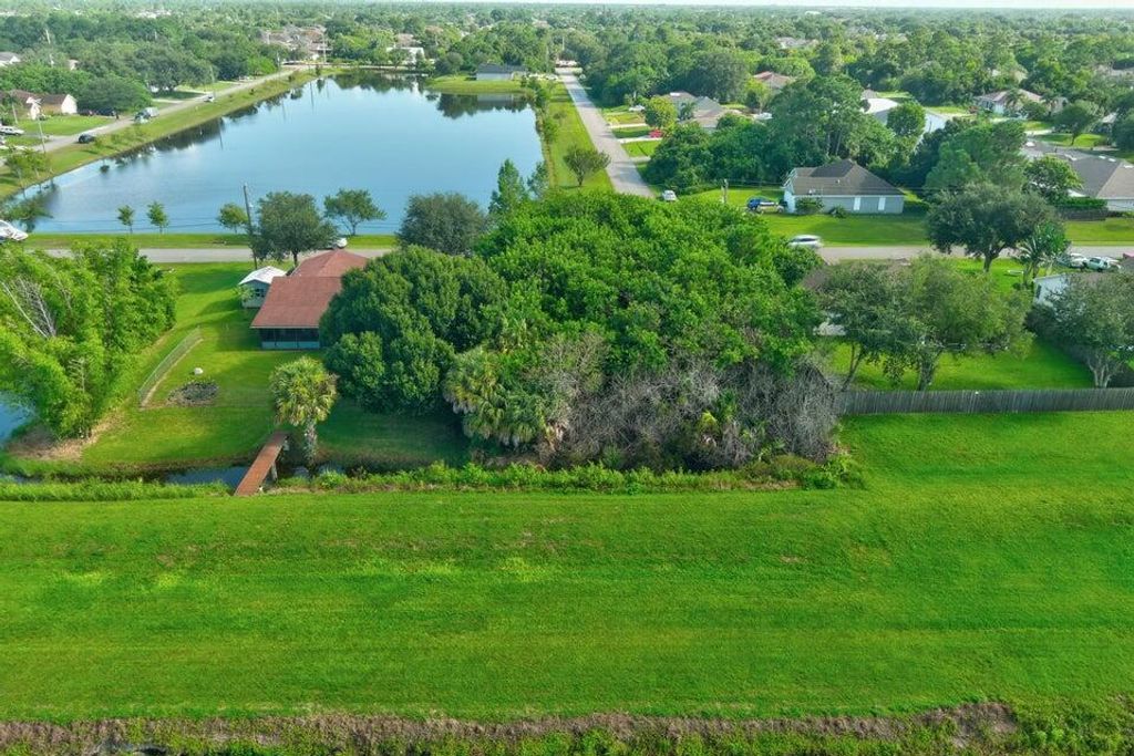 Photo of 990 SW Abbot Avenue, Port Saint Lucie, FL 34953 (MLS # R10981896)