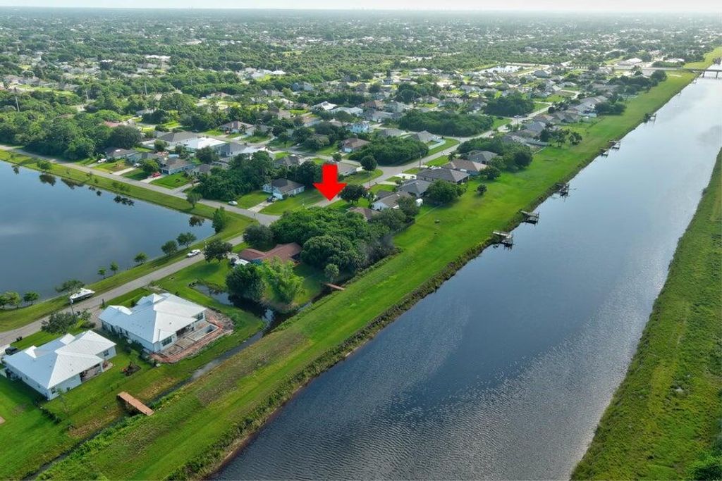 Photo of 990 SW Abbot Avenue, Port Saint Lucie, FL 34953 (MLS # R10981896)