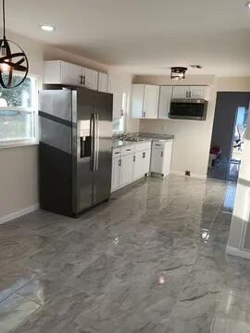 Photo of 107 Bedford Drive, Fort Pierce, FL 34946 (MLS # B26017428)