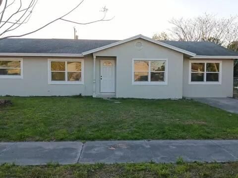 Photo of 107 Bedford Drive, Fort Pierce, FL 34946 (MLS # B26017428)