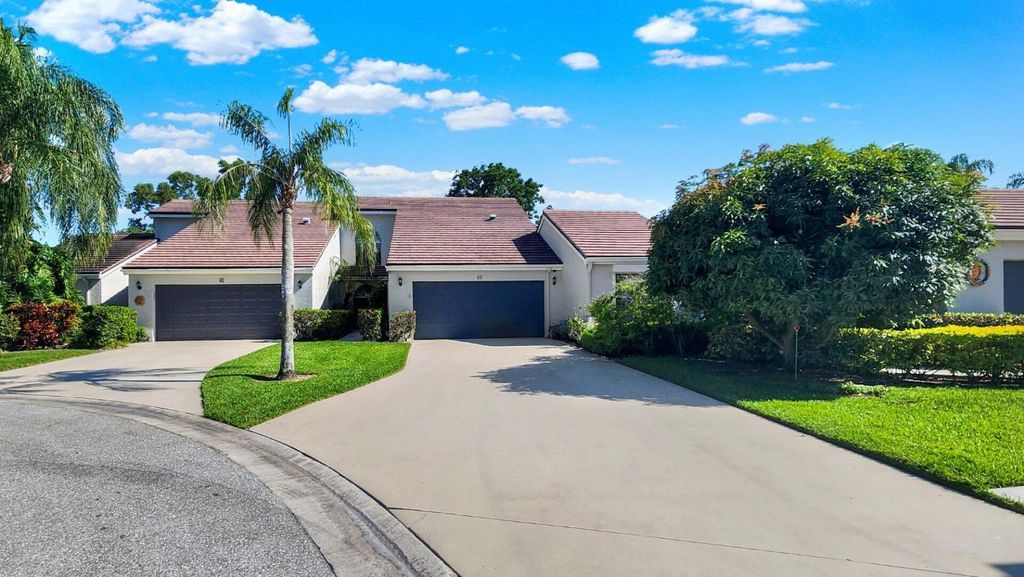 Photo of 60 Edinburgh Drive, Palm Beach Gardens, FL 33418 (MLS # R11082940)