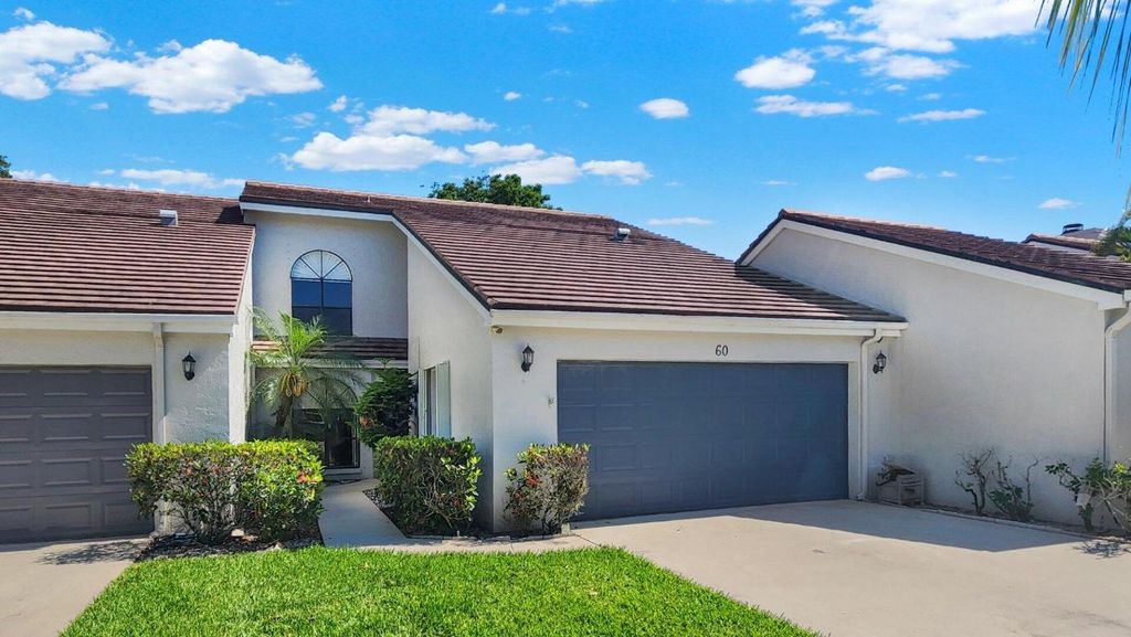 Photo of 60 Edinburgh Drive, Palm Beach Gardens, FL 33418 (MLS # R11082940)