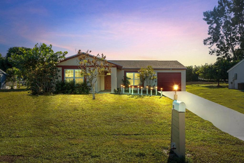 Photo of 244 SW Cherryhill Road, Port Saint Lucie, FL 34953 (MLS # R11144865)