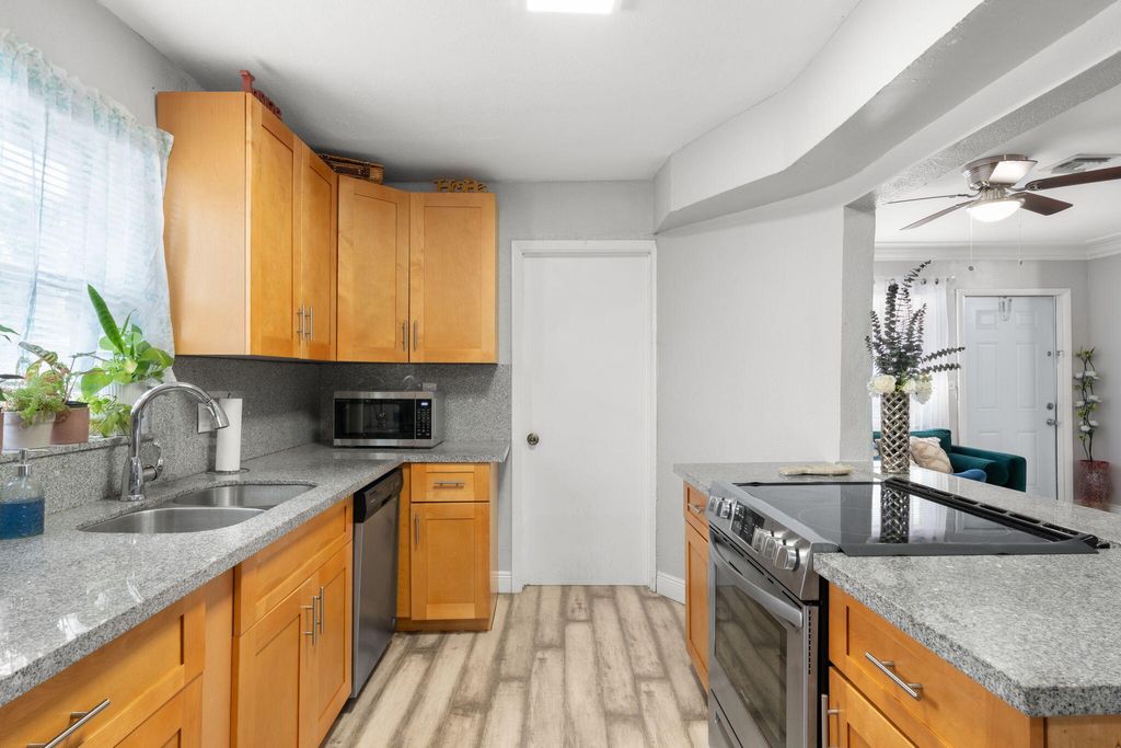 Photo of 1241 NW 30th Avenue, Fort Lauderdale, FL 33311 (MLS # B26024585)