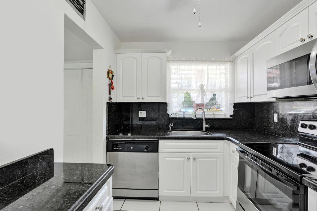 Photo of 2651 Sunrise Lakes Drive E #104, Sunrise, FL 33322 (MLS # B26069949)
