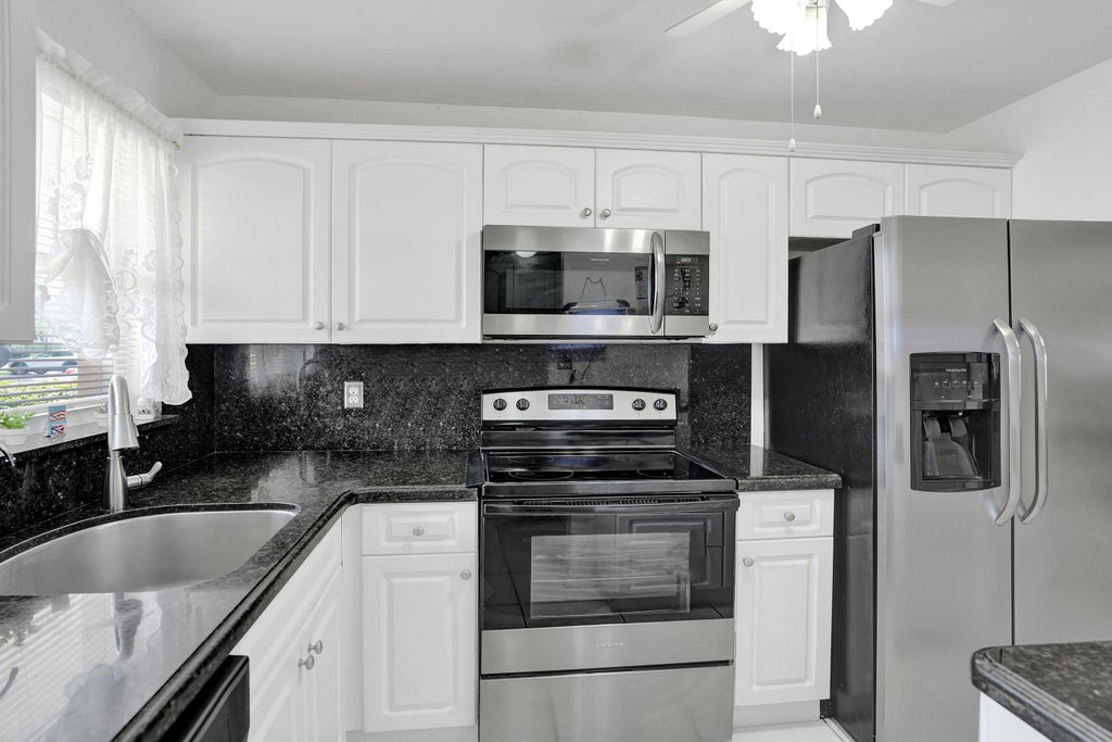 Photo of 2651 Sunrise Lakes Drive E #104, Sunrise, FL 33322 (MLS # B26069949)