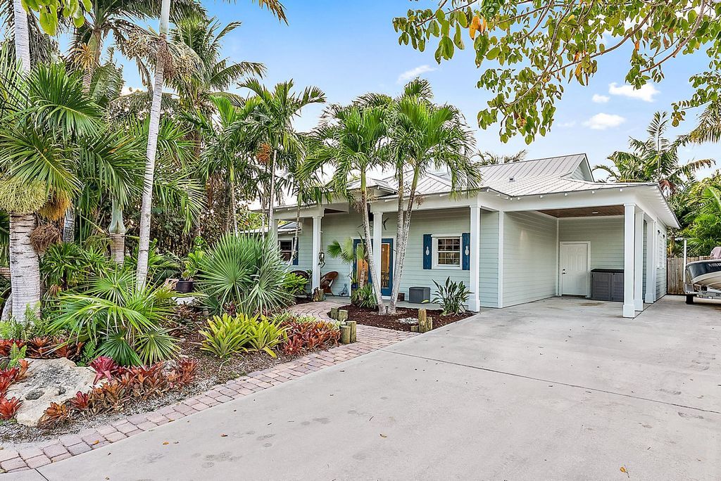 Photo of 5573 SE Harbor Terrace, Stuart, FL 34997 (MLS # R10969172)