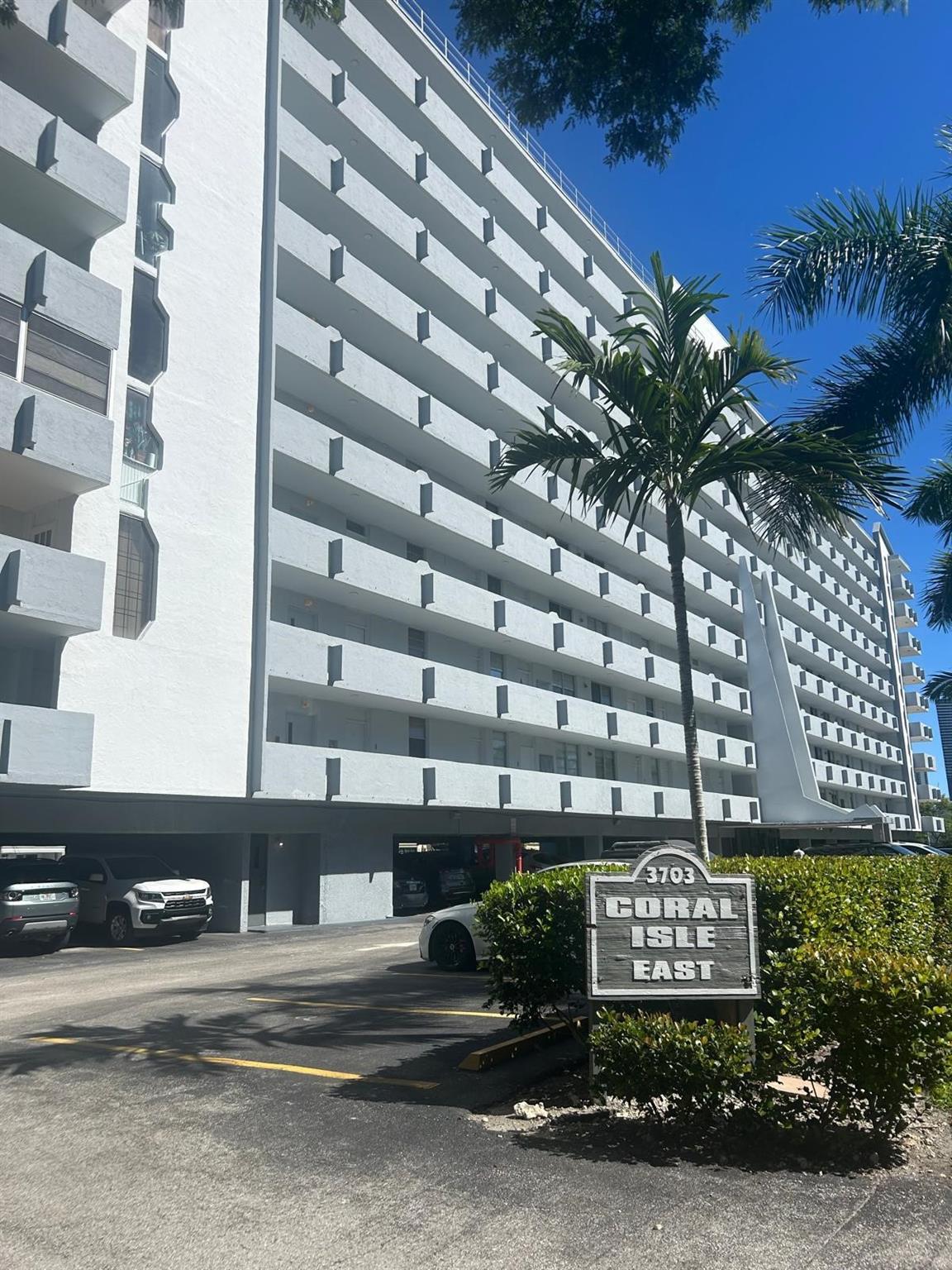 Experience a serene waterfront living in this beautifully maintained condo in Eastern Shores. The community is guard-gated 24/7, offering comfort, privacy, and peace of mind. Step inside to find a bright and open layout featuring white tile flooring throughout, a large bedroom with a standard closet and a walk-in closet and en-suite bathroom, plus an additional half bathroom for guests. The entrance of the apartment features a large closet, providing extra storage space. The bright kitchen with white appliances also offers a small dining nook. The private balcony from this top floor unit offers tranquil views of the peaceful canal and the perfect spot for morning coffee or sunset relaxation.