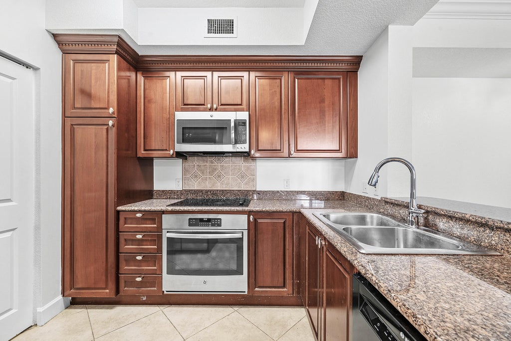 Photo of 1660 Renaissance Commons Boulevard #2421, Boynton Beach, FL 33426 (MLS # B26069311)