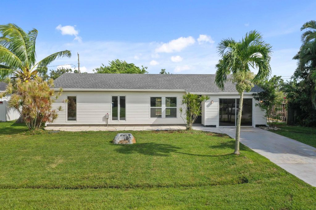 Photo of 2814 SE Buccaneer Circle, Port St Lucie, FL 34952 (MLS # R10915784)