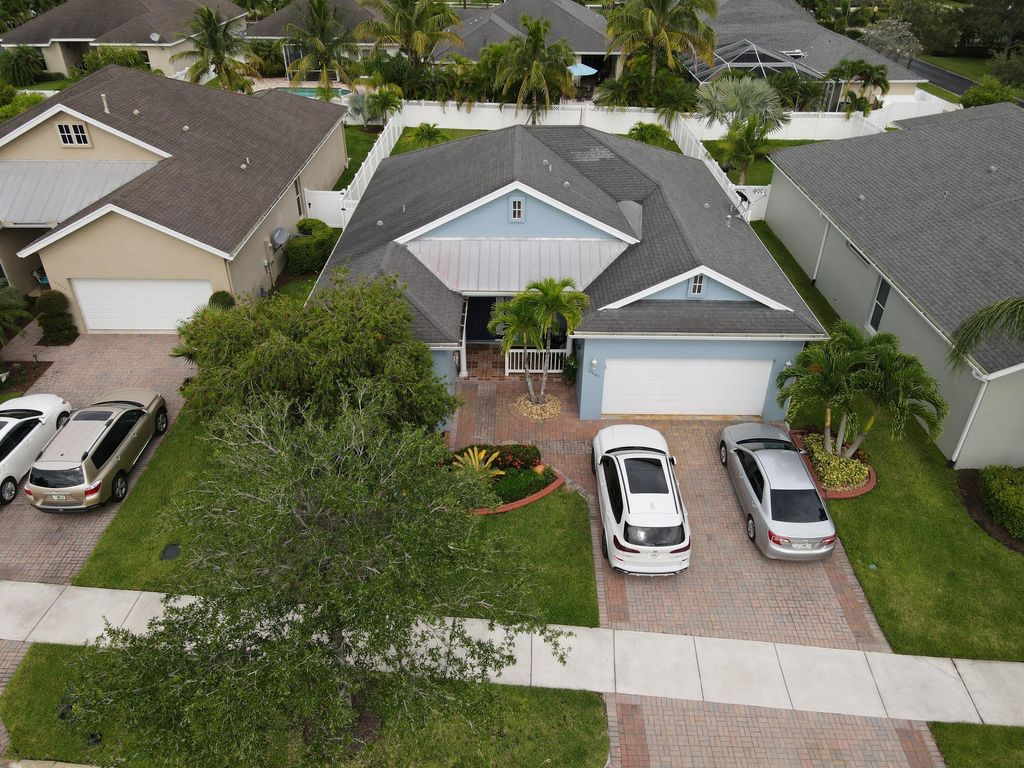Photo of 10680 SW Waterway Lane, Port Saint Lucie, FL 34987 (MLS # R10796651)