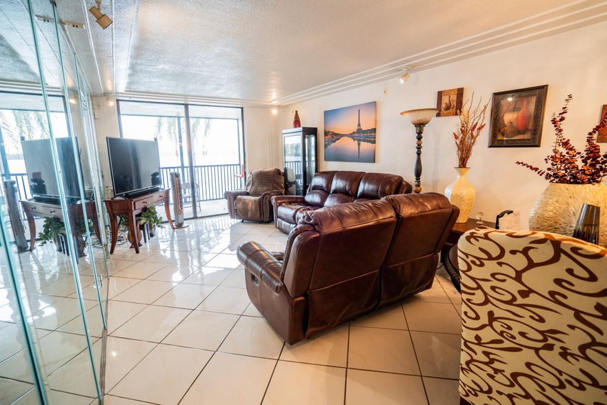 Welcome to one of the best value opportunities in Lake Emerald, a gated waterfront community in the heart of Oakland Park. This 2-bedroom, 2-bath residence offers a spacious split-bedroom layout, abundant natural light, and peaceful lake views that create a calm, inviting setting.  If you've been searching for a move-in-ready, fully renovated condo, this may not be the one, and that's exactly why it stands out. This home is well maintained and offers the chance to update and design it to your own style, while securing a position in a desirable community at a more accessible price point. Enjoy your morning coffee overlooking the water, unwind with serene sunset views, and take advantage of resort-style amenities including pools, tennis, fitness center, clubhouse, walking paths, and 24-hour gated entry.  Located just minutes from Fort Lauderdale beaches, Wilton Manors, shopping, dining, and major highways, this is an ideal opportunity for buyers looking to balance lifestyle, location, and long-term value.  A smart entry into South Florida waterfront living with room to make it your own.  There is a current HOA special assessment; Seller will pay in full prior to closing. This provides a strong advantage for the buyer, as required community improvements will be completed without future financial impact. Association includes exterior maintenance, common areas, security, manned gate, cable, internet, water & sewer. Conveniently located near Fort Lauderdale, Wilton Manors, shopping, dining, and major highways. 40 Year Certification completed.