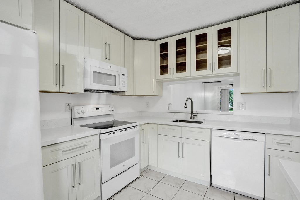 Photo of 3081 HOLIDAY SPRINGS Boulevard #102-6, Margate, FL 33063 (MLS # B26079880)