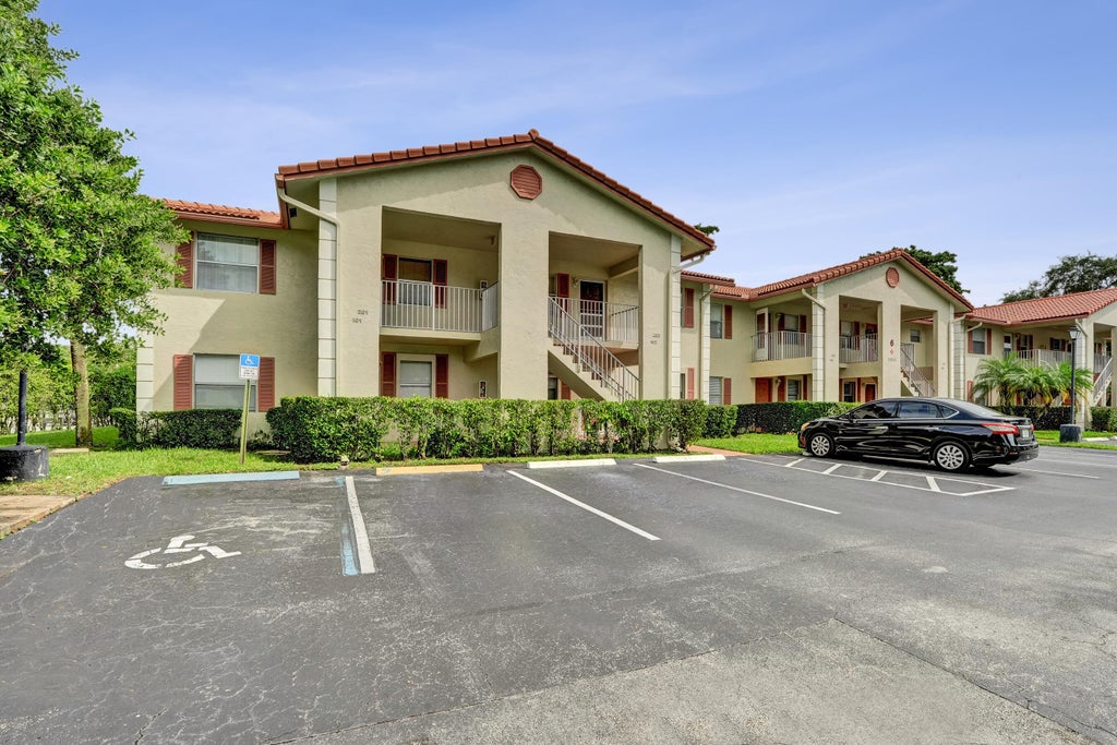Photo of 3081 HOLIDAY SPRINGS Boulevard #102-6, Margate, FL 33063 (MLS # B26079880)