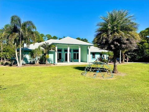Photo of 11666 SW Meadowlark Circle, Stuart, FL 34997 (MLS # R11141704)