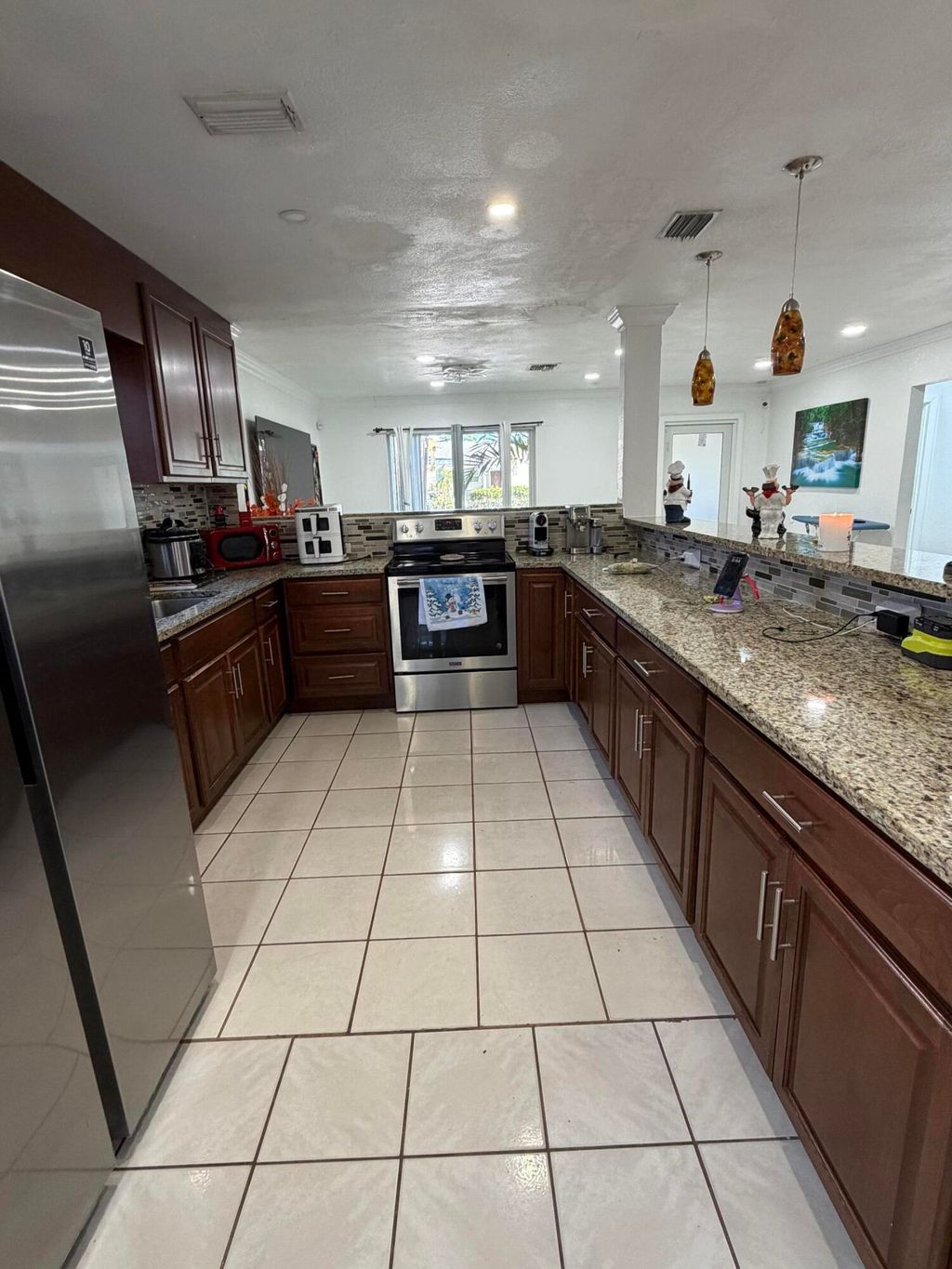 Photo of 814 Colonial Road, West Palm Beach, FL 33405 (MLS # B26005784)