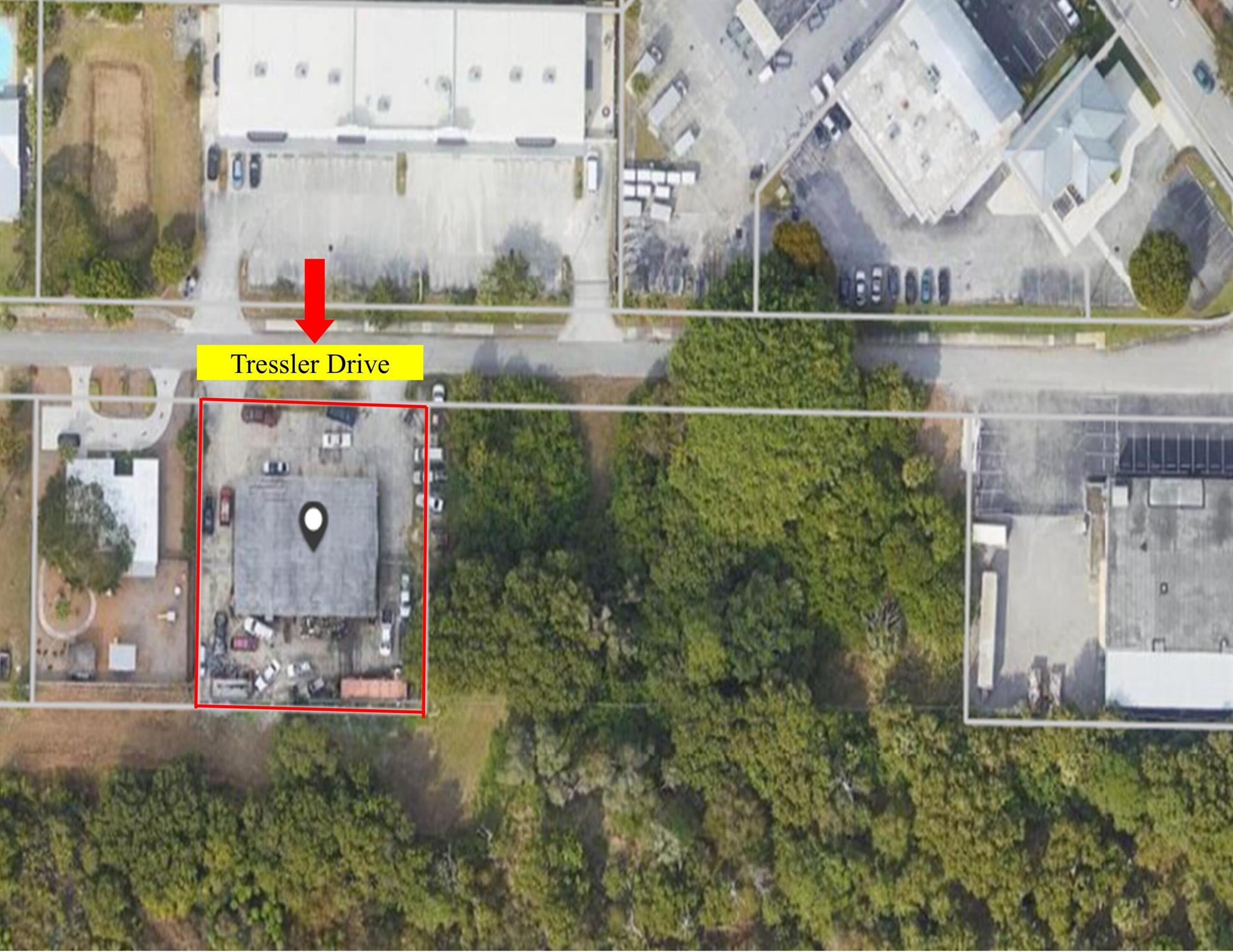 Over 5,000 square foot concrete block warehouse currently leased by a long term tenant on a month to month basis. Building can be sold by itself or current tenant will consider selling existing transmission business which has been in existence for decades. Owner selling building to settle estate. The existing building offers three separate bays each with it's own office and bathroom plus it's own roll up doors in front and in back. Just under 1/2 an acre in total land size. Plenty of existing parking spaces outside. Fenced in rear yard. Frontage on Tressler Drive with quick access to US1 near downtown Stuart. The new Monterey extension passes directly behind.