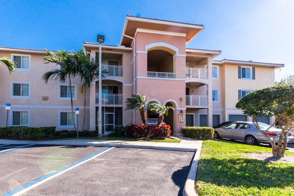 Photo of 6492 EMERALD DUNES Drive #205, West Palm Beach, FL 33411 (MLS # B26078313)