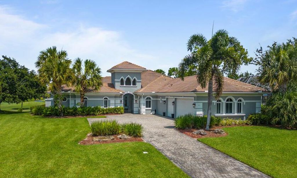 Photo of 872 SW Squire Johns Lane, Palm City, FL 34990 (MLS # R10899943)