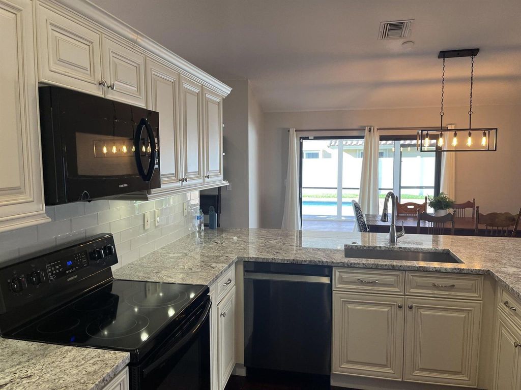 Photo of 6027 Sunberry Circle, Boynton Beach, FL 33437 (MLS # R11132897)