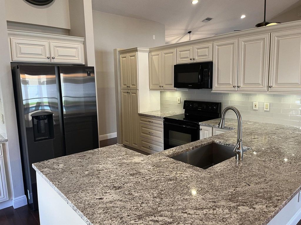 Photo of 6027 Sunberry Circle, Boynton Beach, FL 33437 (MLS # R11132897)