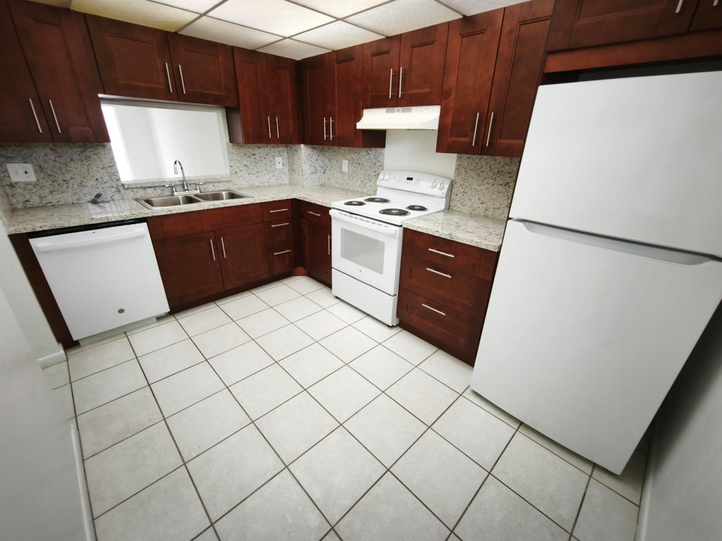 Photo of 8720 Shadow Wood Boulevard #308, Coral Springs, FL 33071 (MLS # B26082816)