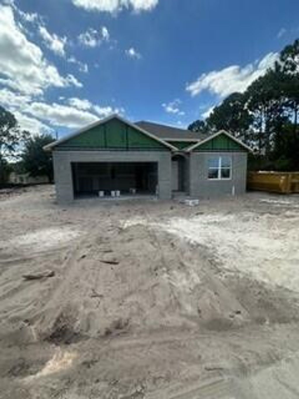 Photo of 3038 SW Port St Lucie Boulevard, Port Saint Lucie, FL 34953 (MLS # R10965639)
