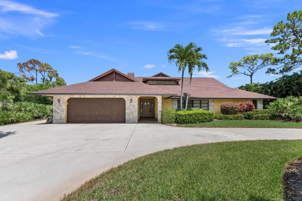 Photo of 919 NE Juniper Place, Jensen Beach, FL 34957 (MLS # R11013956)