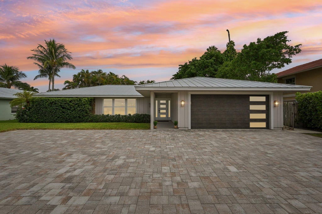 Photo of 2610 Sun Cove Lane, North Palm Beach, FL 33408 (MLS # B26073628)