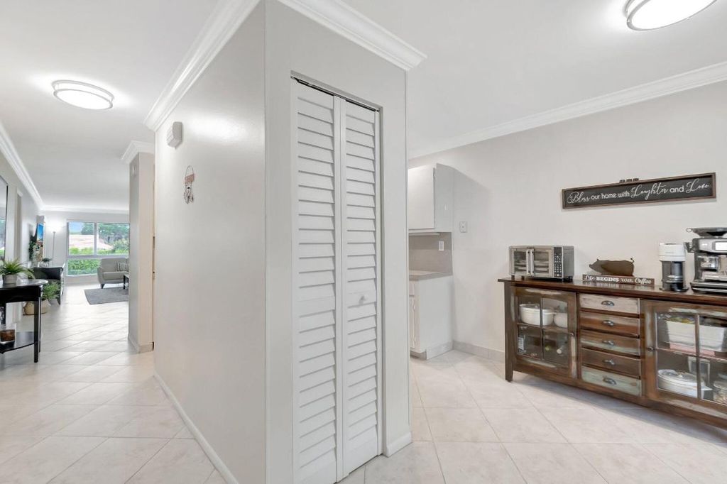 Photo of 5635 Queen Palm Ct #Unit E, Delray Beach, FL 33484 (MLS # R11126532)