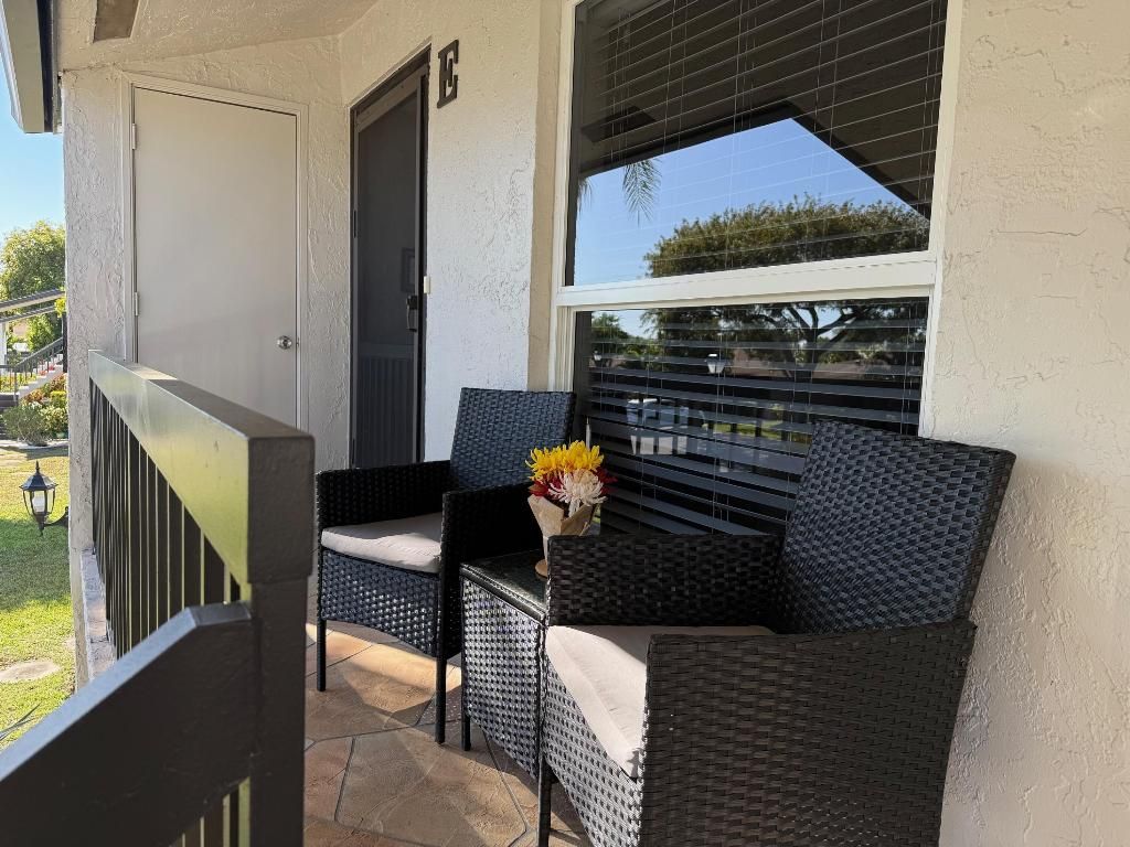 Photo of 5635 Queen Palm Ct #Unit E, Delray Beach, FL 33484 (MLS # R11126532)