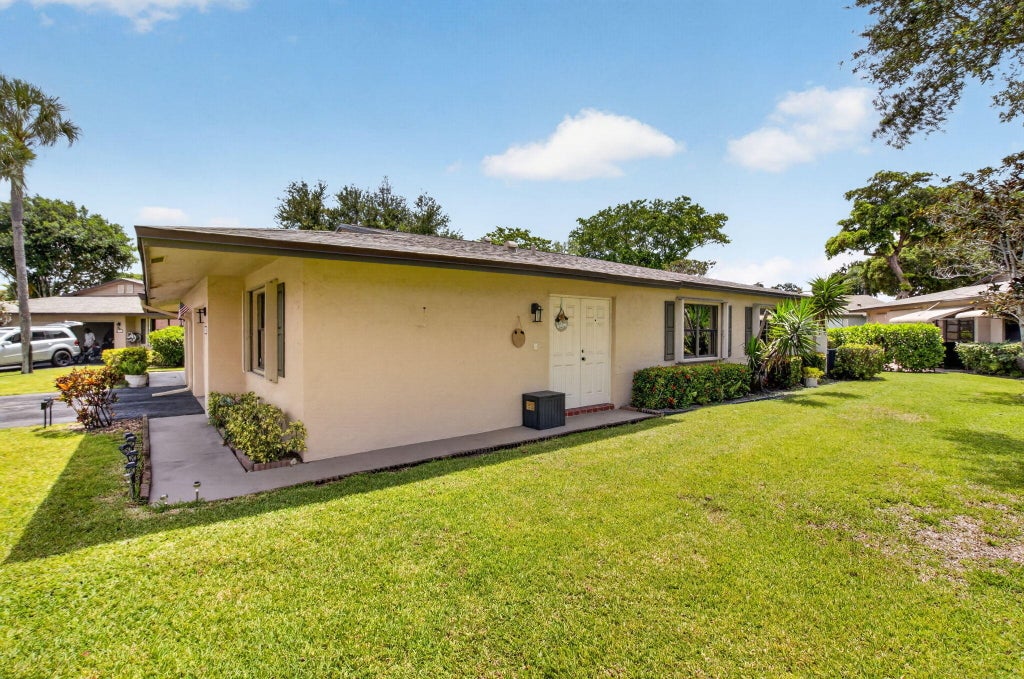 Photo of 1632 Palmland Drive, Boynton Beach, FL 33436 (MLS # B26052030)