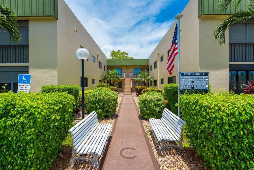 Move in Ready!  Don't Miss This One!! Lovely first floor condo with newer kitchen, beautiful tiled floors,walk in closets,large living room, enclosed lanai,and storm shutters on windows. Guard gated community -clubhouse amenities include fitness center, card room, theatre with shows, heated swimming pool, hot tub, BBQ area, tennis, pickleball, shuffleboard, library, clubs. Very active friendly community. Close to shopping, all major roadways, four miles to Downtown Delray.