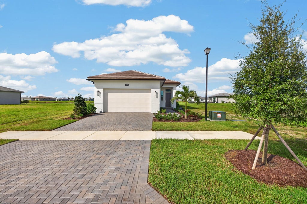 Photo of 7920 SW ANDREA Way, Port Saint Lucie, FL 34987 (MLS # B26072929)
