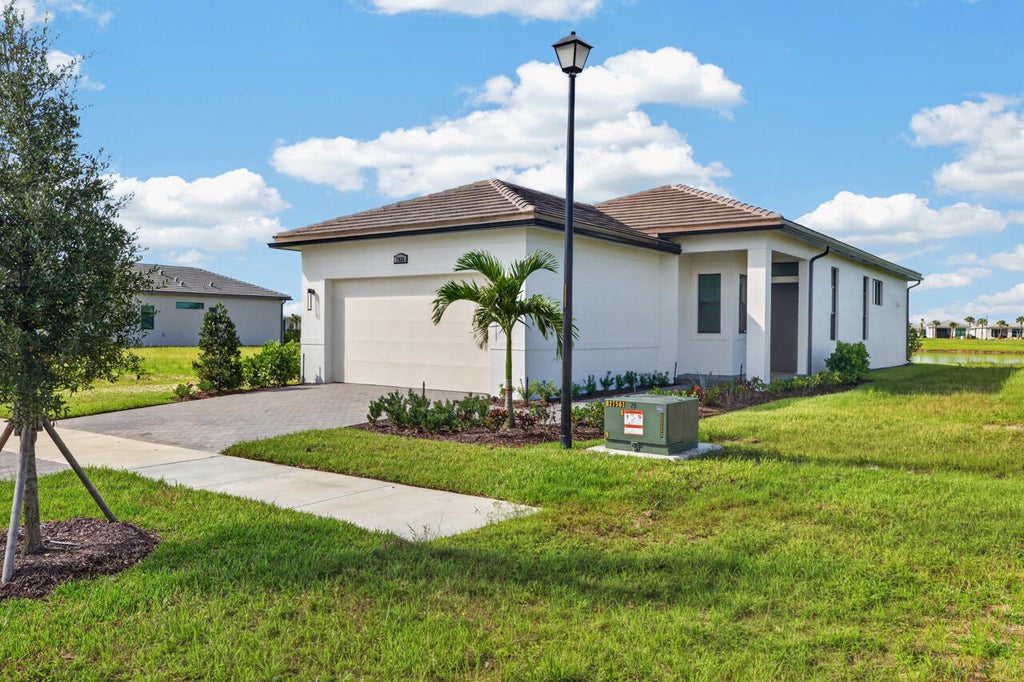Photo of 7920 SW ANDREA Way, Port Saint Lucie, FL 34987 (MLS # B26072929)