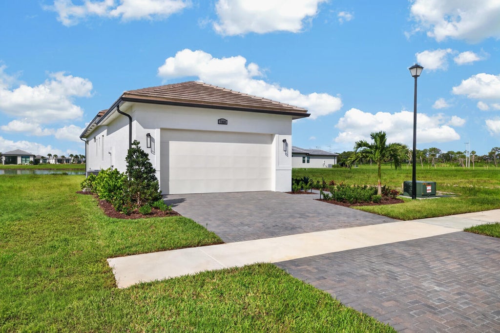 Photo of 7920 SW ANDREA Way, Port Saint Lucie, FL 34987 (MLS # B26072929)