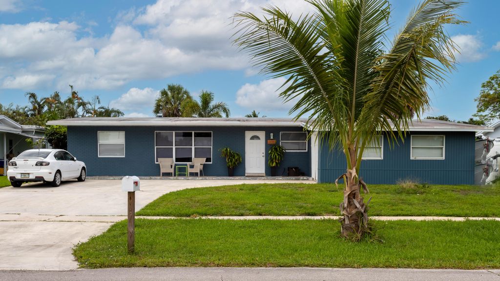 Photo of 309 Riverdale Road Rd, Palm Springs, FL 33461 (MLS # R10812560)