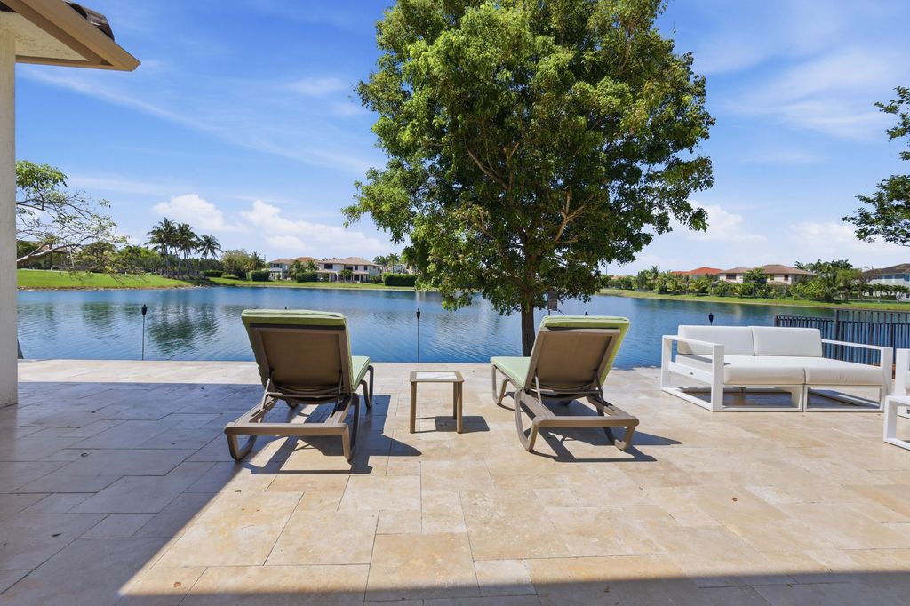 Photo of 10271 Peninsula Place, Parkland, FL 33076 (MLS # B26028242)