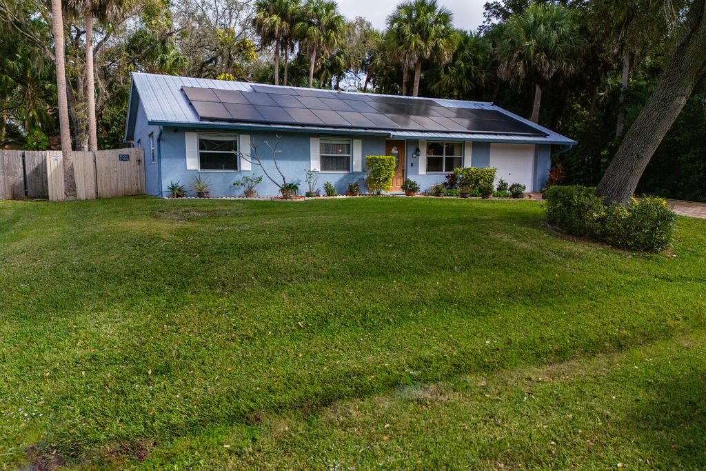Photo of 1653 SW Lexington Drive, Port Saint Lucie, FL 34953 (MLS # R10950948)