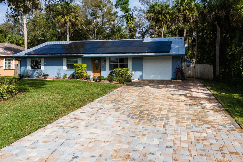 Photo of 1653 SW Lexington Drive, Port Saint Lucie, FL 34953 (MLS # R10950948)