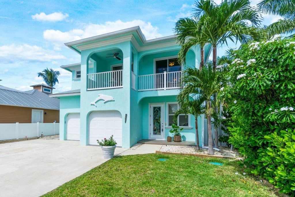 Photo of 9427 SE Athena Street, Hobe Sound, FL 33455 (MLS # R11157838)