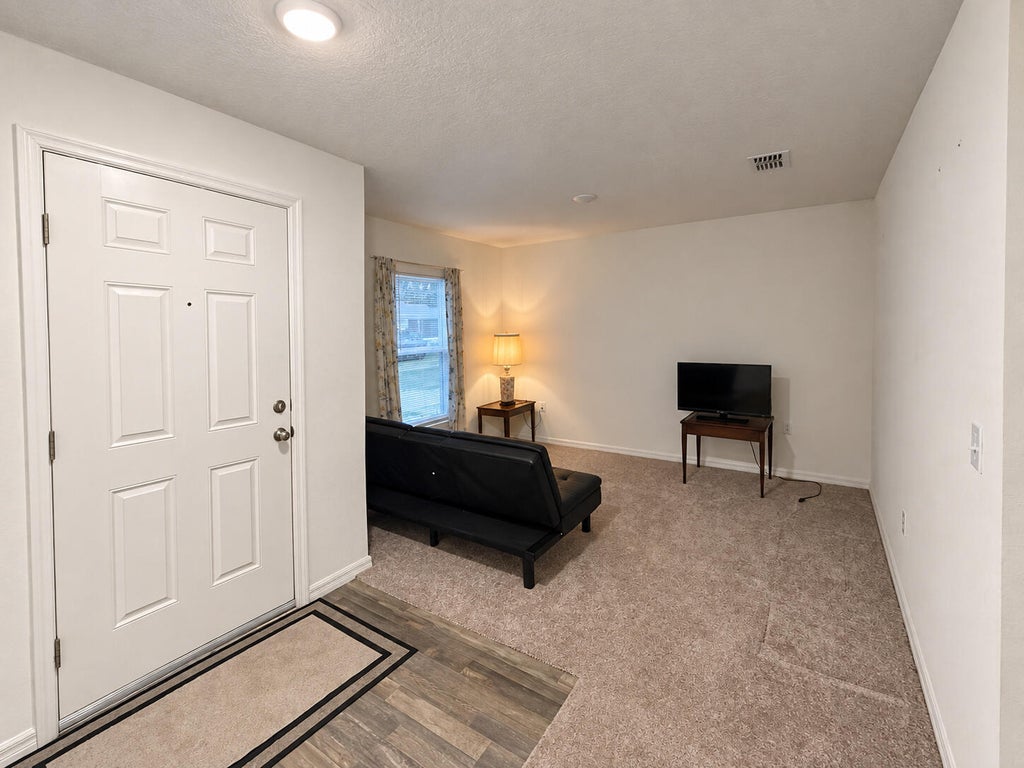 Photo of 4065 SW Hablow Street, Port Saint Lucie, FL 34953 (MLS # B26078374)