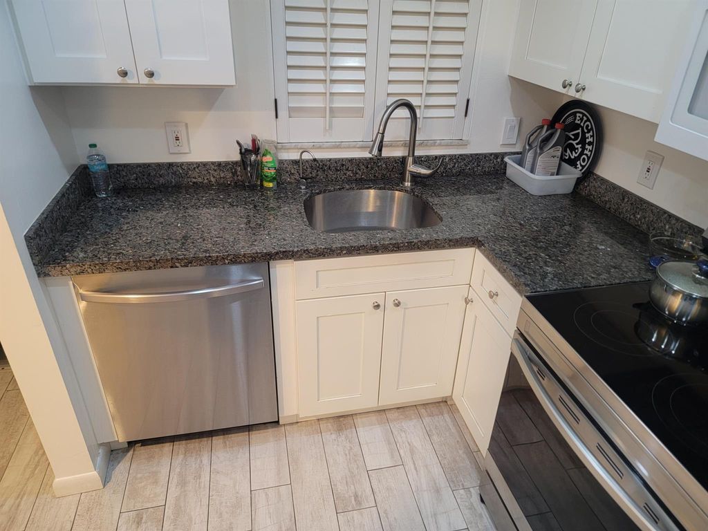 Photo of 1638 Embassy Dr #202 Drive, West Palm Beach, FL 33401 (MLS # R11034830)